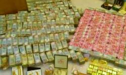 छापे के दौरान आठ करोड़ रुपयों की नगदी और विदेशी मुद्रा भी मिली