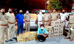 दूध वाहन व होंडा सिटी कार हो रही थी शराब की तस्करी में इस्तेमाल दूध वाहन व होंडा सिटी कार हो रही थी शराब की तस्करी में इस्तेमाल