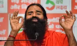 गौतम अडानी के बाद अब रामदेव की कंपनी के रेंग रहे शेयर- निवेशकों..