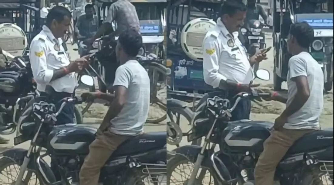 ट्रैफिक पुलिसकर्मी ने बाइक सवार युवक से ली रिश्वत-वीडियो वायरल