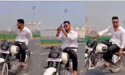 रंगबाज का टशन- चलती बुलेट पर बेखौफ पिस्टल लहराकर बनाई रील रंगबाज का टशन- चलती बुलेट पर बेखौफ पिस्टल लहराकर बनाई रील