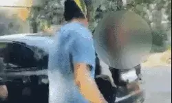 कार में प्रेमी संग मस्ती लेती मिली पत्नी पर बरसाया डंडा