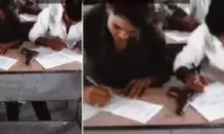 बेंच पर पिस्टल रखकर छात्रों ने दी परीक्षा- मामले से शिक्षा विभाग में..