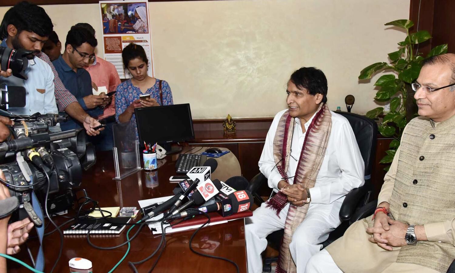 Union Minister for Commerce & Industry,  Suresh Prabhakar Prabhu interacting with the media after taking additional charge of the Ministry of Civil Aviation, in New Delhi on March 12, 2018. The Minister of State for Civil Aviation, Jayant Sinha is also seen.
