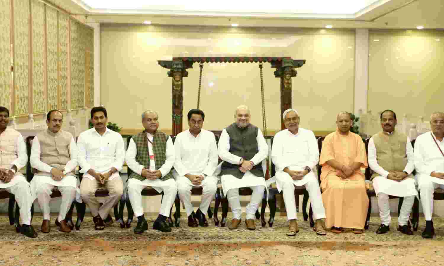 The Union Home Minister Amit Shah in a group photograph, during the review meeting on security issues with the Chief Ministers of Left Wing Extremism (LWE) affected states, in New Delhi