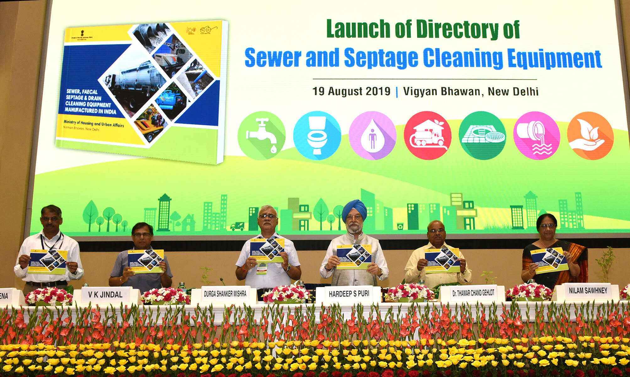 The Union Minister for Social Justice and Empowerment,  Thaawar Chand Gehlot and the Minister of State for Housing & Urban Affairs, Civil Aviation (Independent Charge) and Commerce & Industry, Hardeep Singh Puri launching the directory of Sewer and Septage Cleaning Equipment, at the National Workshop Cum-Exhibition on Sustainable Sanitation, jointly organised by the Ministry of Social Justice & Empowerment and Ministry of Housing & Urban Affairs, in New Delhi on August 19, 2019. The Secretary, Ministry of S