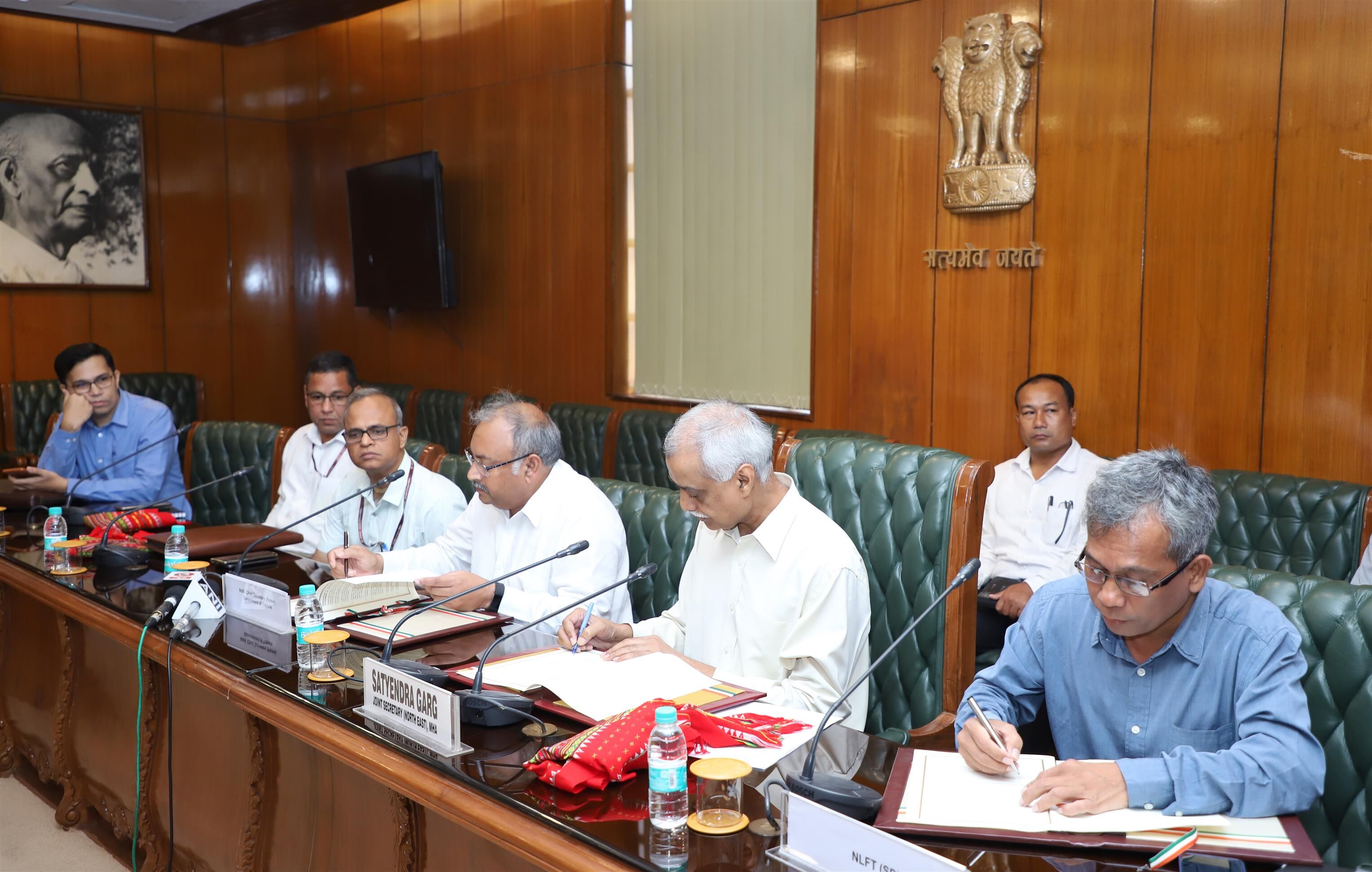 The Joint Secretary (NE) MHA, Styendra Garg, the Additional Chief Secretary (Home) Govt. of Tripura, Kumar Alok and NLFT-SD representatives signing the Memorandum of settlement, in New Delhi .