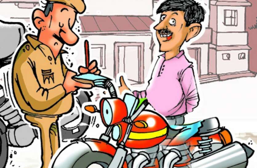 महावीर चौक पर पुलिस ने काटा चालान, जेई ने कर दी बत्ती गुल महावीर चौक पर पुलिस ने काटा चालान, जेई ने कर दी बत्ती गुल